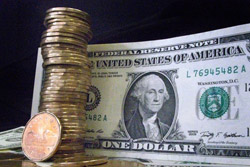 Канадский доллар упал до 11-летнего минимума по отношению к доллару США